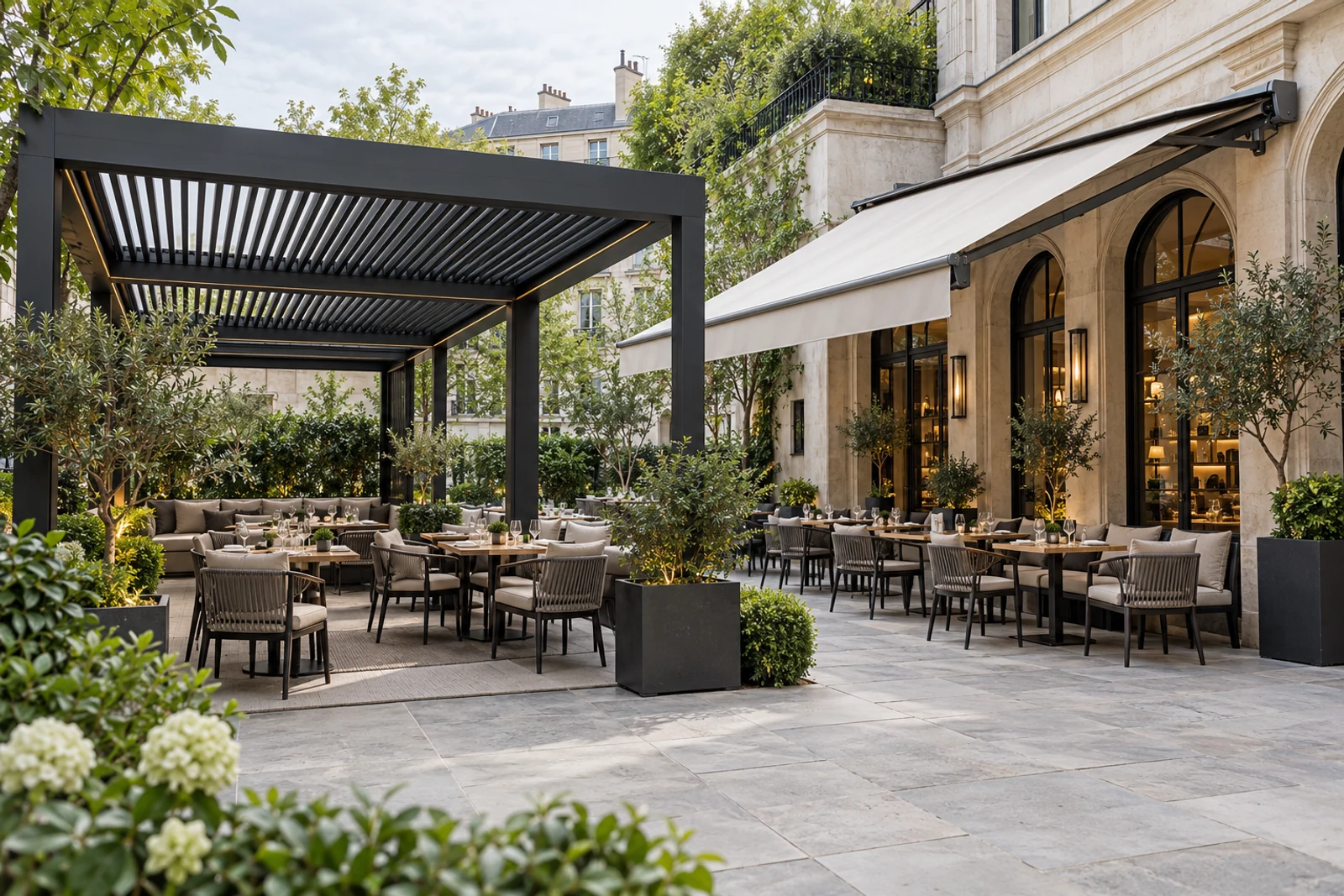 Restaurant terrace comparing a rigid aluminum louvered pergola with a wall-mounted retractable fabric awning